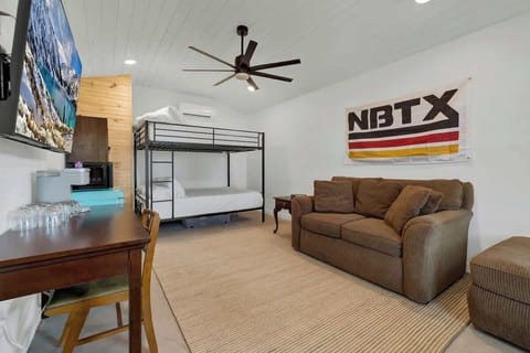 Queen over queen bunk beds in the bunkhouse.