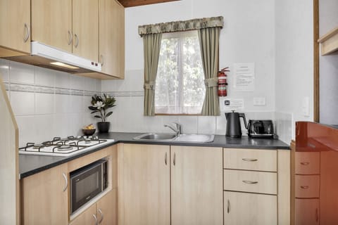 Budget Villa | Private kitchen | Full-size fridge, microwave, stovetop, coffee/tea maker