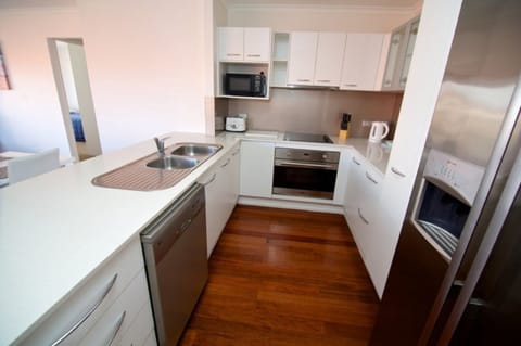 Apartment, 2 Bedrooms, 2 Bathrooms, Partial Ocean View | Private kitchen | Full-size fridge, microwave, oven, stovetop