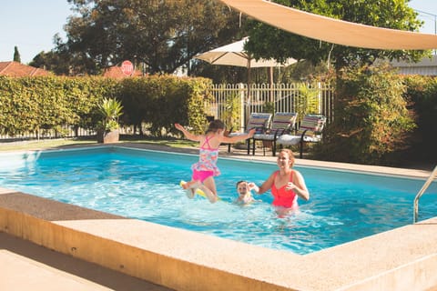 Outdoor pool, open 10:00 AM to 9:30 PM, sun loungers