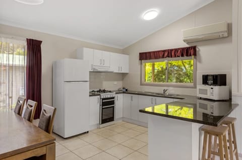 Deluxe 3 Bedroom Spa Villa | Private kitchen | Full-size fridge, microwave, oven, stovetop