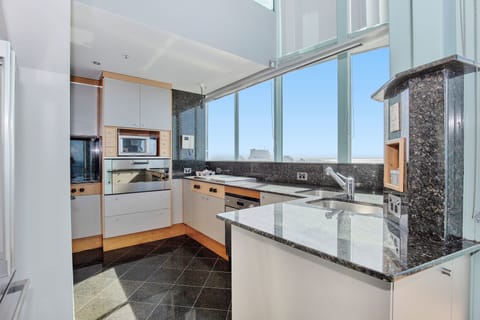 Skyhome Penthouse 3 Bedroom Ocean View | Private kitchen | Full-size fridge, microwave, oven, stovetop