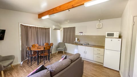 Deluxe Family Chalet – 2 Bedrooms | Living area | TV