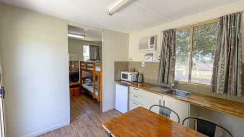 Standard Family Cabin 2 Bedroom – Shared Bathroom (No Bathroom inside Room) | Private kitchen | Fridge, microwave, stovetop, electric kettle