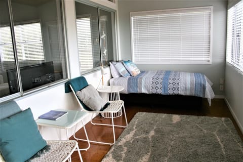 Beach Apartment | Blackout drapes, iron/ironing board, bed sheets