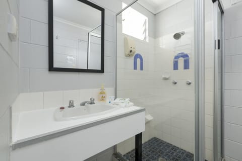 Double Room | Bathroom | Shower, free toiletries, towels