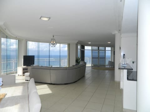 Penthouse, 4 Bedrooms | Living area | TV, video-game console, DVD player