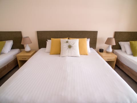 Family Deluxe Room | Iron/ironing board, free WiFi, bed sheets