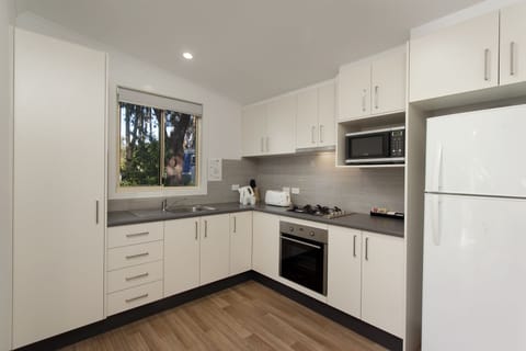 Executive Villa | Private kitchen | Full-size fridge, microwave, stovetop, coffee/tea maker