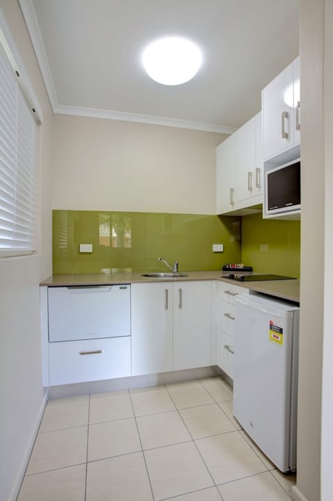 One Bedroom Apartment | Private kitchen | Fridge, microwave, coffee/tea maker, electric kettle