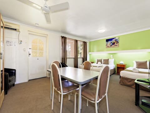 Family Room, Multiple Beds | Desk, iron/ironing board, free WiFi, bed sheets