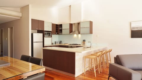 Two Bedroom Apartment | Private kitchen | Full-size fridge, microwave, oven, stovetop