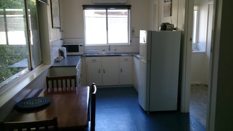 Full-size fridge, microwave, stovetop, coffee/tea maker