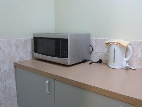 Fridge, microwave, coffee/tea maker, electric kettle