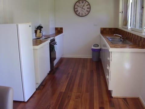 Full-size fridge, microwave, stovetop, coffee/tea maker