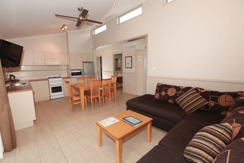 Standard Suite, Multiple Bedrooms, Non Smoking, Kitchen (Elevated Seaside Cabin) | Living area | Flat-screen TV