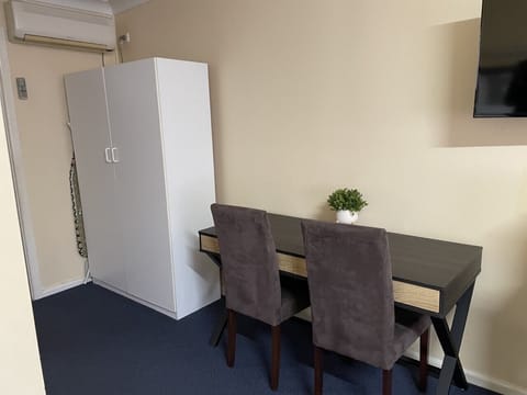 Family Suite, 2 Bedrooms, Patio, Ground Floor | Living area | Flat-screen TV
