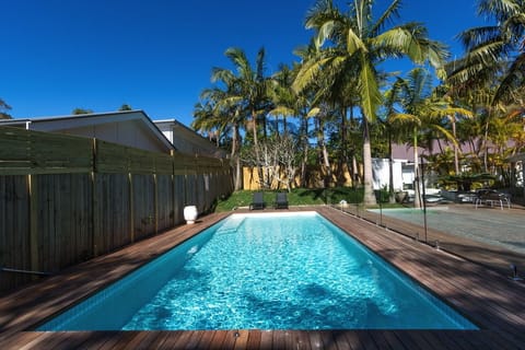 Outdoor pool, pool umbrellas, sun loungers