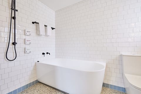 Family Suite | Bathroom | Designer toiletries, hair dryer, towels, soap