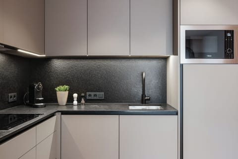 Shared fridge, espresso maker, coffee/tea maker, electric kettle