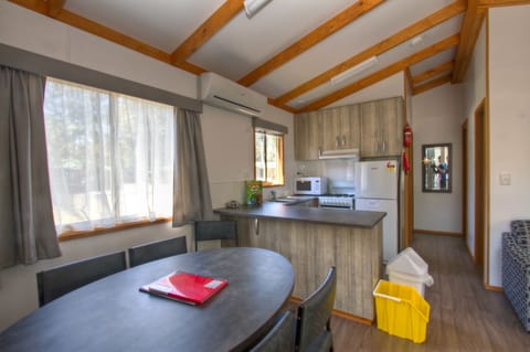 Deluxe Cabin, 2 Bedrooms, Kitchen | Private kitchen | Fridge, electric kettle, toaster, dining tables