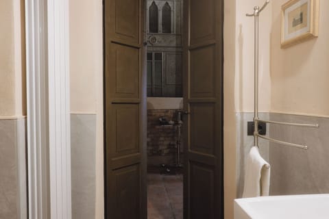 Exclusive Studio Suite | Bathroom | Hair dryer, bathrobes, slippers, towels