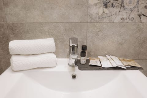 Classic Suite | Bathroom | Hair dryer, bathrobes, slippers, towels