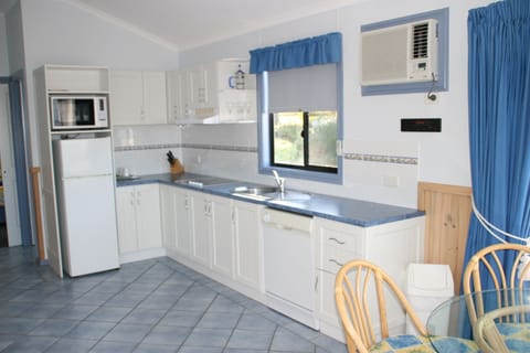 Beach House -Executive -  1 queen, 1 double & 1 single | Private kitchen | Fridge, microwave, stovetop, coffee/tea maker