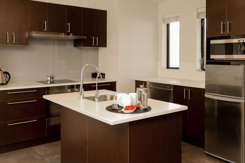 Two Bedroom Luxury Apartment | Private kitchen | Fridge, microwave, oven, stovetop