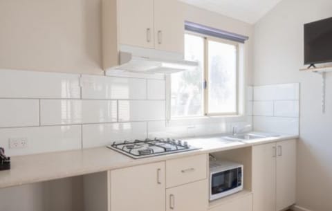 Standard 1 Bedroom - Sleeps 5 | Private kitchen | Full-size fridge, microwave, stovetop, coffee/tea maker