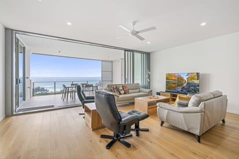 Unit 703 at Rise Maroochydore Beach, 3-Bedroom, Ocean View | Living area | Flat-screen TV, DVD player