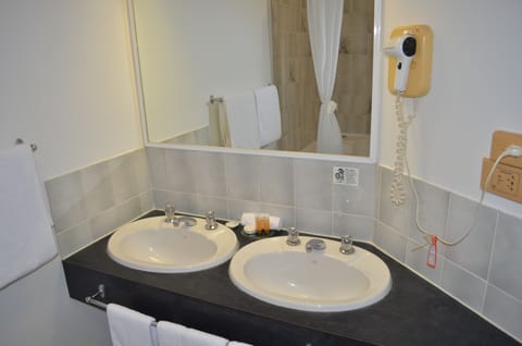 Comfort Room 1 King Bed Jetted Tub - No Pets | Bathroom | Free toiletries, hair dryer, towels