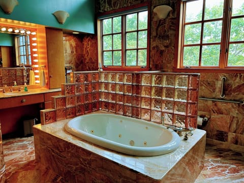 Luxury House | Bathroom | Hair dryer, towels, soap, shampoo