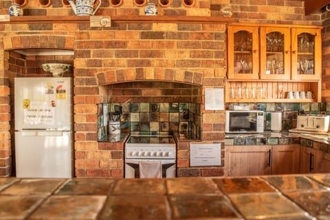 The Cottage (2 Bedrooms) | Private kitchen | Full-size fridge, microwave, stovetop, dishwasher