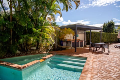 Outdoor pool, pool umbrellas, sun loungers