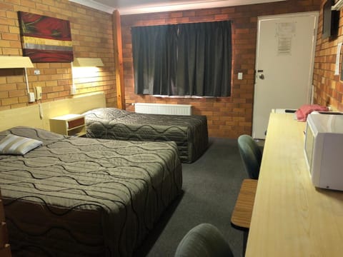 Blackout drapes, iron/ironing board, free WiFi, bed sheets