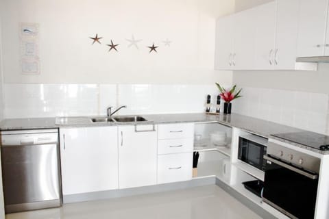 2 Bedroom Beachfront Apartment | Private kitchen | Fridge, microwave, coffee/tea maker, electric kettle