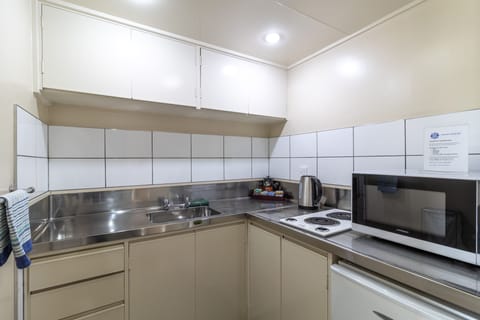 Family Apartment, 2 Bedrooms | Private kitchen | Fridge, microwave, electric kettle, toaster