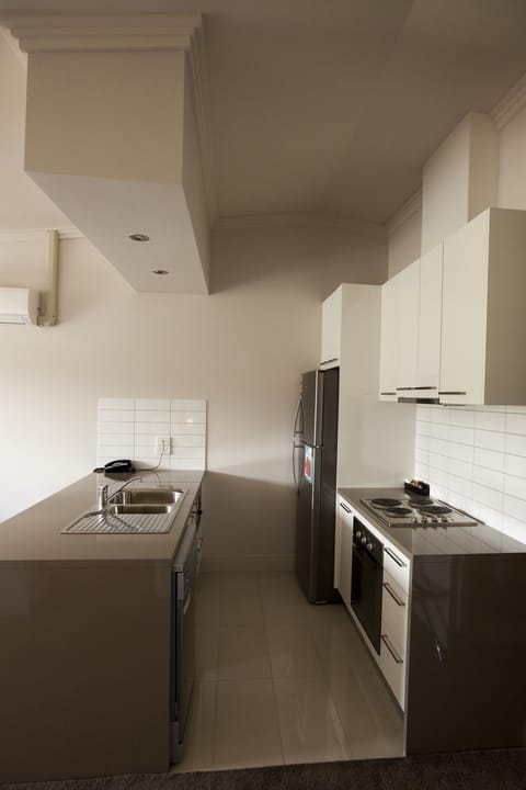 Two Bedroom Apartment | Private kitchen | Fridge, coffee/tea maker, electric kettle