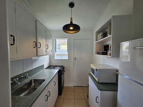 Family Apartment | Private kitchen | Mini-fridge, microwave, electric kettle, toaster