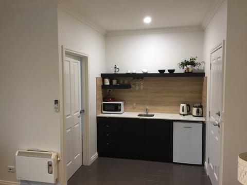 Standard Suite, 1 Bedroom (Tuscany Room) | Private kitchenette | Microwave, coffee/tea maker, electric kettle, cookware/dishes/utensils