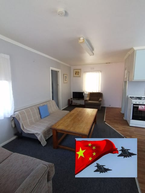 Standard Apartment, 2 Bedrooms, Non Smoking, Kitchen (Large Group Deal - Unit 1) | Living area | TV, DVD player