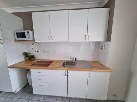 Apartment, 2 Bedrooms | Private kitchen | Fridge, microwave, electric kettle