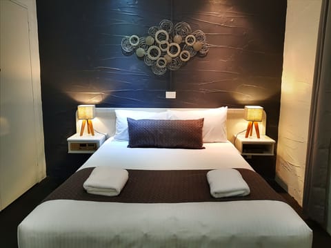 Standard Suite, 1 Bedroom, Non Smoking, Kitchenette (Queen Bed Single Guest) | 1 bedroom, iron/ironing board, free WiFi, bed sheets