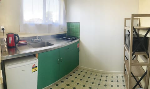 Standard Studio, Non Smoking, Kitchenette (Large Studio Unit) | Private kitchen | Fridge, microwave, stovetop, coffee/tea maker