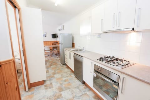 3BR Deluxe Accessible | Private kitchen | Full-size fridge, microwave, toaster, cookware/dishes/utensils