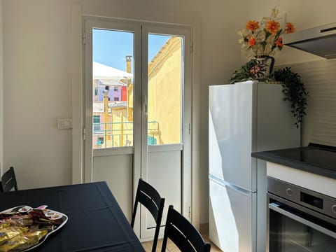 Exclusive Apartment | Private kitchen | Full-size fridge, microwave, oven, stovetop