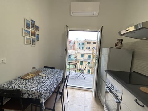 Exclusive Apartment | Private kitchen | Full-size fridge, microwave, oven, stovetop