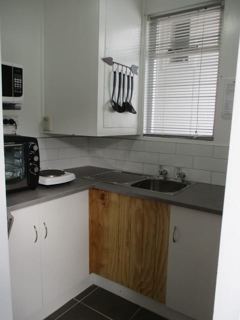 Standard Room, 2 Bedrooms, Courtyard Area | Private kitchen | Fridge, microwave, electric kettle, cookware/dishes/utensils