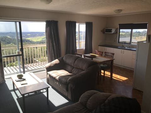 Panoramic Apartment, 1 Bedroom, Kitchenette, Ocean View | Living area | Flat-screen TV